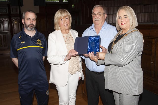 The Mayor, Sandra Duffy making a special presentation to Marty and Margaret Palmer at the Guildhall on Friday night, marking Marty’s late brother Artie, who was a stalwart of the club for many years before his tragic passing. On left is club chairman, Marty Crumley. 