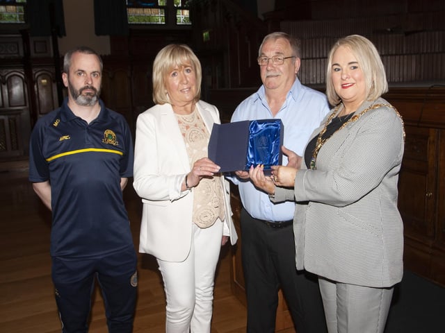 The Mayor, Sandra Duffy making a special presentation to Marty and Margaret Palmer at the Guildhall on Friday night, marking Marty’s late brother Artie, who was a stalwart of the club for many years before his tragic passing. On left is club chairman, Marty Crumley.