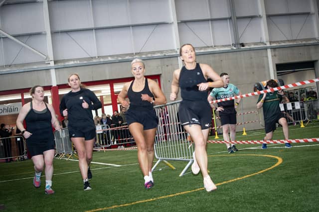 Athletes make their way around the hall at Dolan's on Sunday.