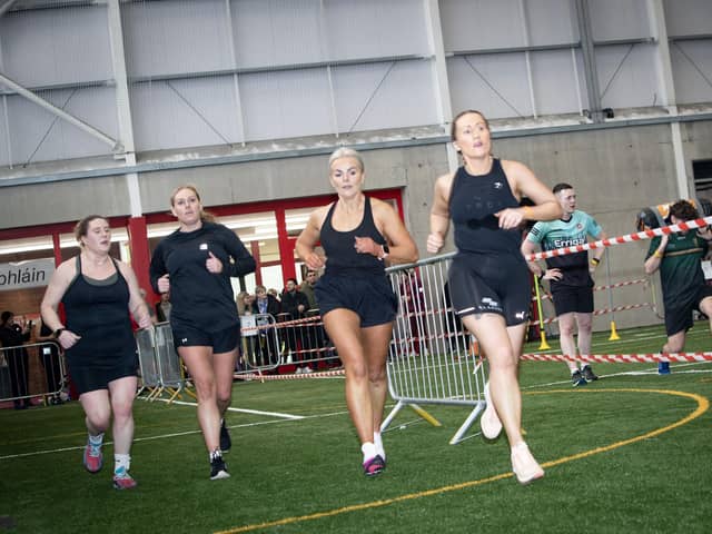 Athletes make their way around the hall at Dolan's on Sunday.