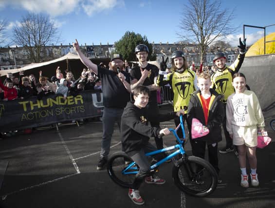 BMX WINNER!. . . . Young Finn O’Kane pictured with his new BMX bike, won at Saturday’s Feile Springtime Fun Day at Bull Park. Included in picture is runners-up and members of the Thunder Action Sports Team. (Photo: Jim McCafferty Photography)