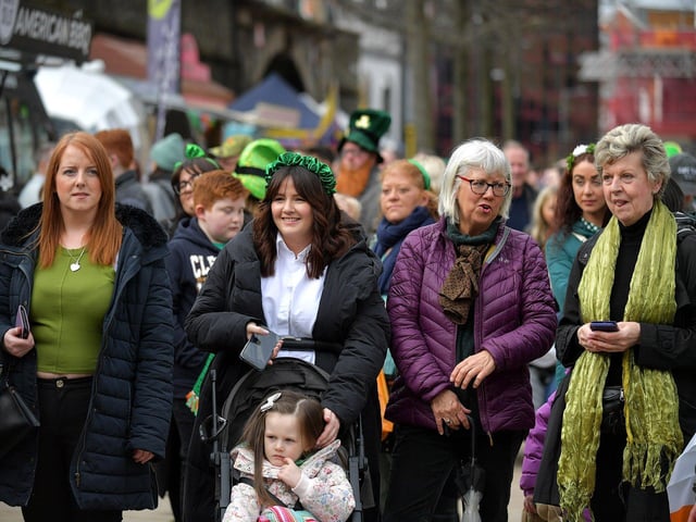 People enjoy the atmosphere at the St Patrick’s Day in Guildhall Square on Friday afternoon. Photo: George Sweeney. DER2311GS – 29