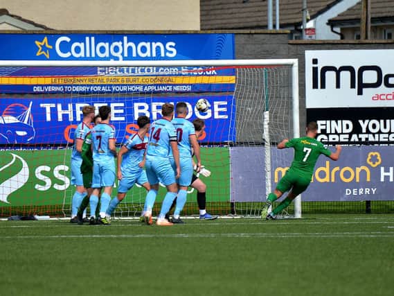 Zach Barr (7) of Newington scores the second goal of his first half hat trick against Institute at the Brandywell on Saturday afternoon. Photograph: George Sweeney. DER2333GS – 97