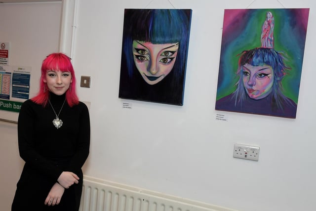 Artist Amber McLaughlin, a past pupil if St Cecilia’s College, pictured alongside some of her work at the launch of the International Women’s Day 2024 Art Exhibition at Eden Arts Place, Pilot’s Row on Thursday afternoon last.  Photo: George Sweeney