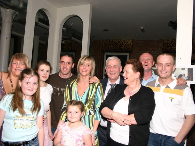 Donna, far left and Michael, centre, enjoying the fun with family and friends. 4808dd