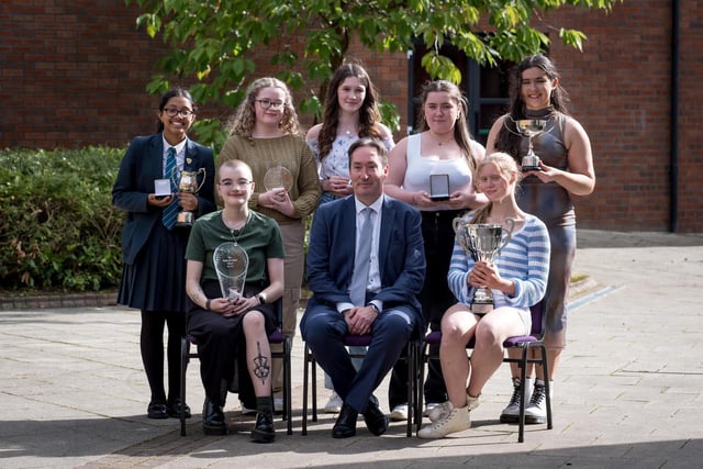 Front Row: Devin Rodgers, Mr Ciaran Hampson (Deputy Chair of the Board of Governors), Sophie Parlour
Back Row: Benita Biju (represented by her sister Jovita), Orlaigh McCorriston, Ciara Irvine, Saoirse Kelly, Róise Ní Mhurchú