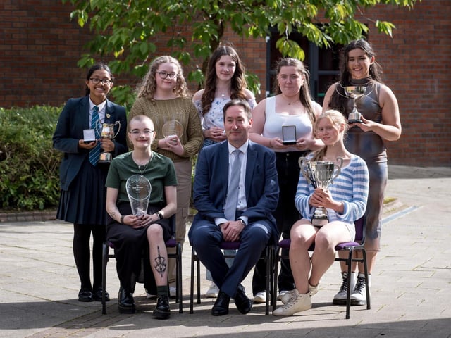 Front Row: Devin Rodgers, Mr Ciaran Hampson (Deputy Chair of the Board of Governors), Sophie Parlour
Back Row: Benita Biju (represented by her sister Jovita), Orlaigh McCorriston, Ciara Irvine, Saoirse Kelly, Róise Ní Mhurchú
