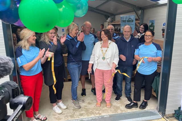 Mayor of Derry Strabane Patricia Logue cuts the ribbon to officially open new Community Shed.