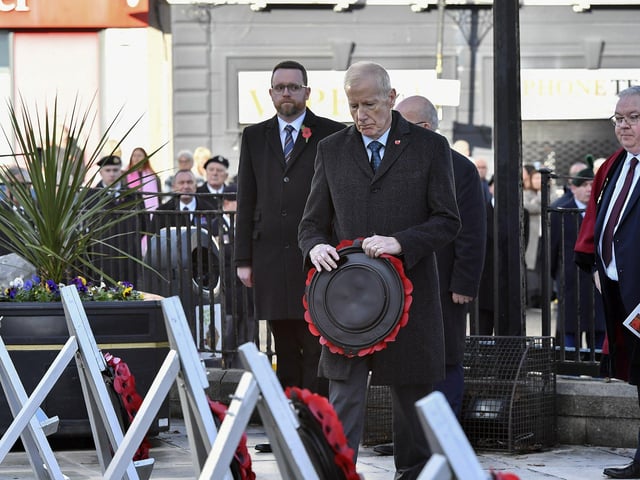 Gregory Campbell MP places a wreath at the Cenotaph in the Diamond during the Royal British Legion Waterside Remembrance Sunday service. Photo: George Sweeney