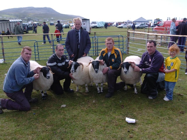 Pat Canny, owner, pictured with the Best Pen of four ewes at ClonmanyShow. included, are Edward, Liam Henry, James and Asling Canny. (0508A42) : Clonmany Festival, Vintage Show, Agricultural Show and Raft Race in August 2005.