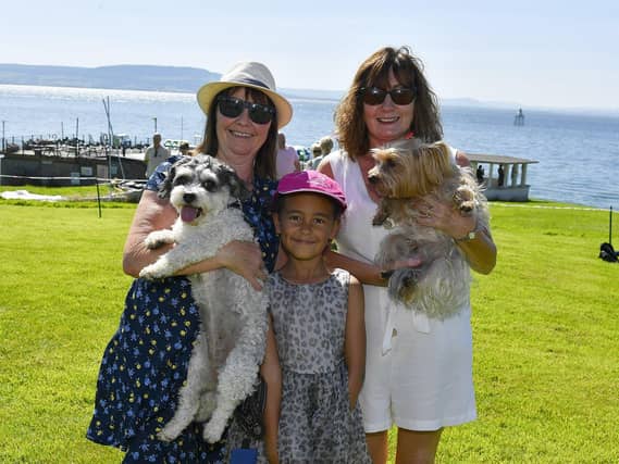 Lady and Rosie with Sheila McCormack, Alanna McCormack and Eileen Barr at the Moville Summer Festival Pet Show, held on The Green. Photo: George Sweeney