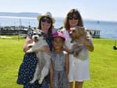 Lady and Rosie with Sheila McCormack, Alanna McCormack and Eileen Barr at the Moville Summer Festival Pet Show, held on The Green. Photo: George Sweeney