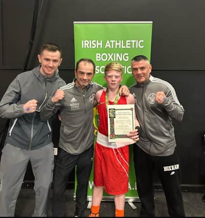 Irish champion Joshua Cairns pictured with Oakleaf coaches Barry McCafferty, Eugene ‘Budge’ O’Kane and Christy Doherty.