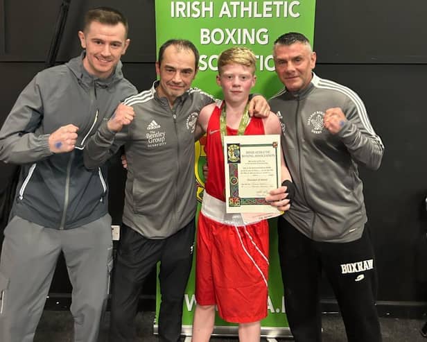 Irish champion Joshua Cairns pictured with Oakleaf coaches Barry McCafferty, Eugene ‘Budge’ O’Kane and Christy Doherty.