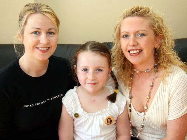 Caitlin smiles for the camera with her mum Shauna and Donna on the occasion of her 7th birthday 0008JML : Parties and celebrations April 2006: Kaitlin Quigg.