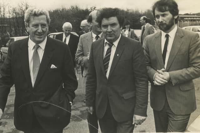 Hume and McArt with Garret FitzGerald, during the Taoiseach's visit to the Journal offices in 1985. The visit was the first to the North by a serving Irish leader in almost twenty years.