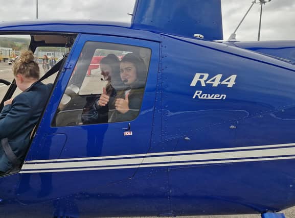VIP tour and helicopter ride over Amelia’s flight path.
