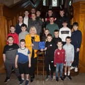 The Mayor of Derry City and Strabane District Council, Sandra Duffy makes a special presentation to junior members of St. Joseph’s Boxing Club to mark the club’s celebration of 30 years in existence, during a reception in the Guildhall on Thursday night last.