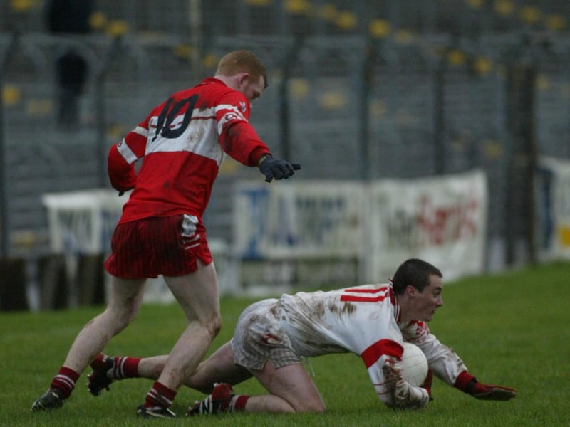 Derry's Fergal Doherty tangles with Tyrone's Mickey Coleman in Healy Park back in 2004.