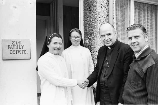 Sister Breda, the co-ordinator of the Family Centre at Gobnascale, Derry, welcoming the Bishop of Derry, Most Rev Dr Edward Daly. Also in the photo are Sr Eilish, the assistant co-ordinator, and  Robert Brolly, chairman of the Family Centre Committee. (2204MM01)