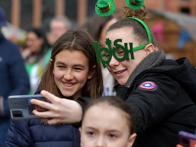 People enjoy the atmosphere at the St Patrick’s Day in Guildhall Square on Friday afternoon. Photo: George Sweeney. DER2311GS – 30