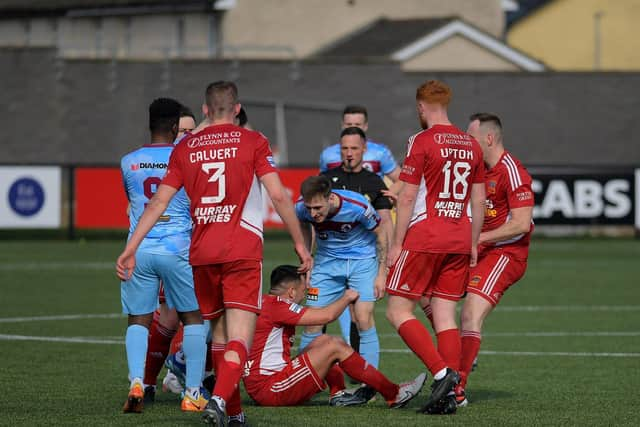 Tempers flare during the game between Institute and Annagh United. Photograph: George Sweeney