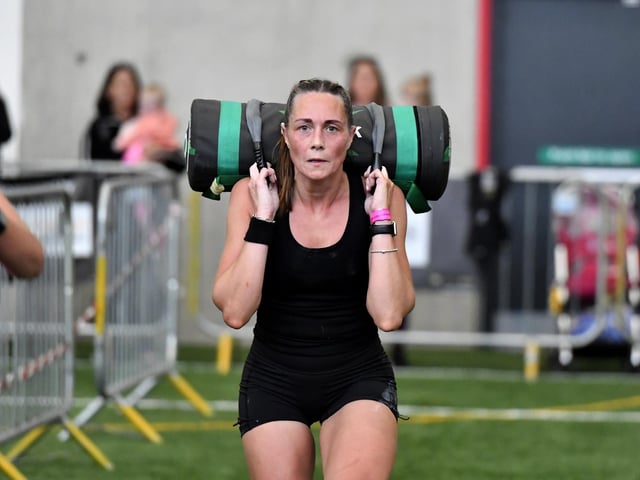 This competitor pictured during the Sandbag lunges station in the Maiden City Hyrox IV held at Sean Dolans GAC. Photograph: George Sweeney