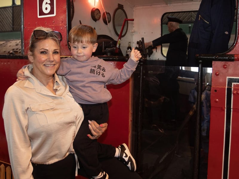 Grandmother Amanda McDevitt and grandson Lennon (4) exploring the trains during Tuesday's BBQ and Fun Day at Destined.