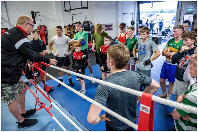 Some of the Co. Derry William Wallace Box Cup squad get some instructions from coaches during a training session at Oakleaf Boxing Club.