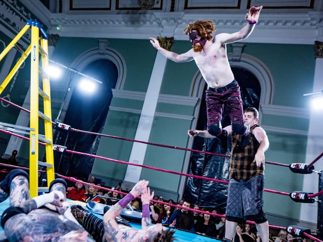 From the top rope.
