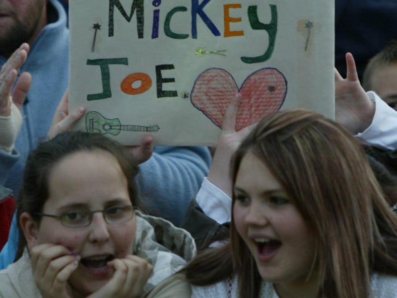 Adoring Mickey Harte fans scream as he arrives on stage. (0107JB97)