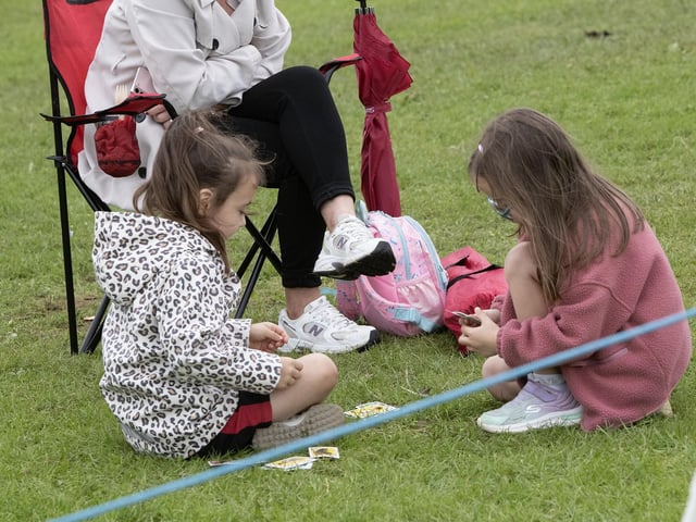 These youngsters keep themselves entertained during the mini soccer.