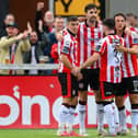 Ellis Chapman of Derry City, second from left, celebrates with teammates, from left, Darragh Burns, Adam O'Reilly and Nick Twisk after he scores his side's first goal against Shamrock Rovers.
