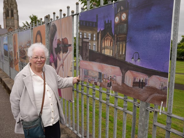Talented artist Sadie Harrigan with one of the artworks at John Clifford Park.