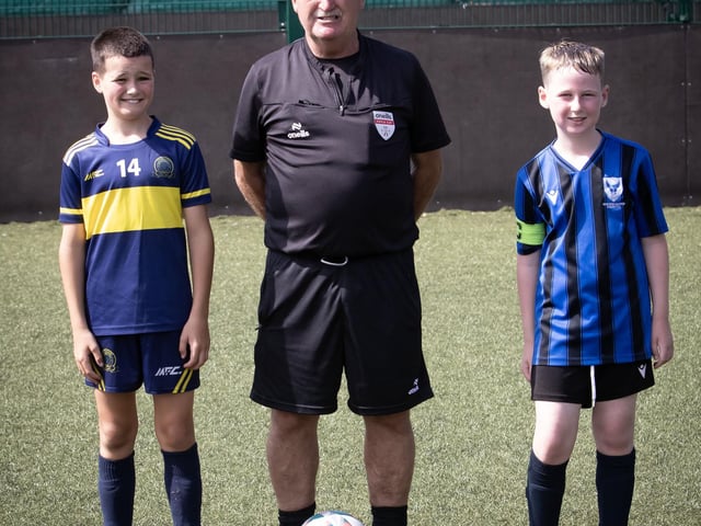 Padraig Barton Cup final referee Martin Dunne with the captains of Don Boscos and Oxford.