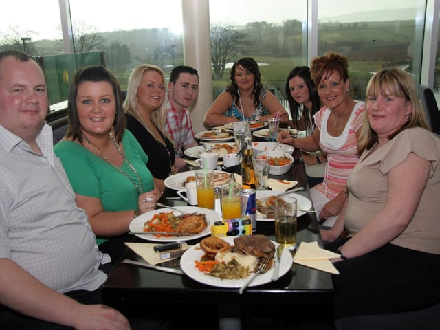 Friends and family enjoy a meal at Pitchers to celebrate the Christening of baby Shanice 0175JML : Parties and celebrations April 2006: Shanice Devine.