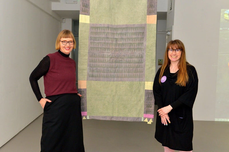 Artist Joy Gerrard, left, and Catherine Hemelryk, Director of the CCA, pictured beside Sarah Diver Lang’s Energy Quilt, selected work from artists for the Centre for Contemporary Art’s ‘Urgencies’ Exhibition which runs until 18th March next. Photo: George Sweeney. DER2304GS – 25
