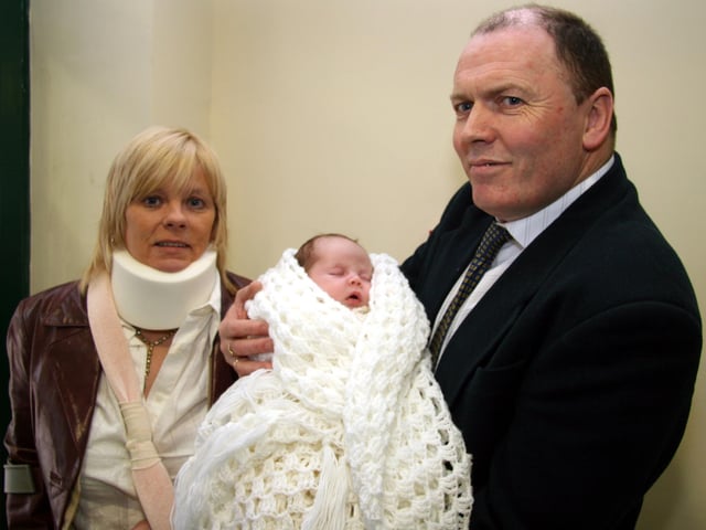 Proud grandparents Geraldine and Eugene McGinley pictured with baby Gerard at his Christening party 0018JML : Parties and nights out in March 2006