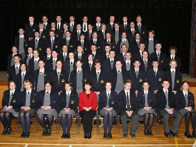 Students at Lumen Christi College who achieved seven or more 'A' grades at GCSE pictured with the vice-principal Catherine Rawdon. (1411T05).:Lumen Christi College prizegiving ceremony in 2003