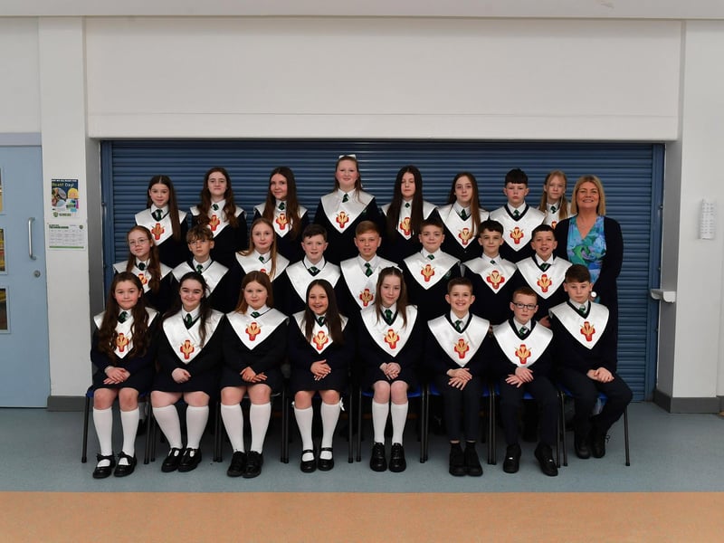 St Patrick's Primary School teacher Mrs C. Doherty with her P7 class who were confirmed by Fr. D. Mc Grattan in Pennyburn Church on 7th March. Photo: George Sweeney