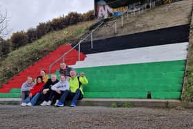 Derry IPSC activists pictured after they painted the red, black, white and green colours of the flag of Palestine on steps beneath the Foyle Bridge.