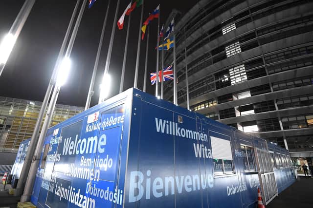 This picture taken on January 31, 2020 shows Union flag from the United Kingdom Representation removed from the European Parliament, in Strasbourg, on Brexit Day. - Britain left the European Union at 2300 GMT on January 31, 2020, 43 months after the country voted in a June 2016 referendum to leave the block. The withdrawal from the union ended more than four decades of economic, political and legal integration with its closest neighbours. (Photo by Patrick HERTZOG / AFP) (Photo by PATRICK HERTZOG/AFP via Getty Images)