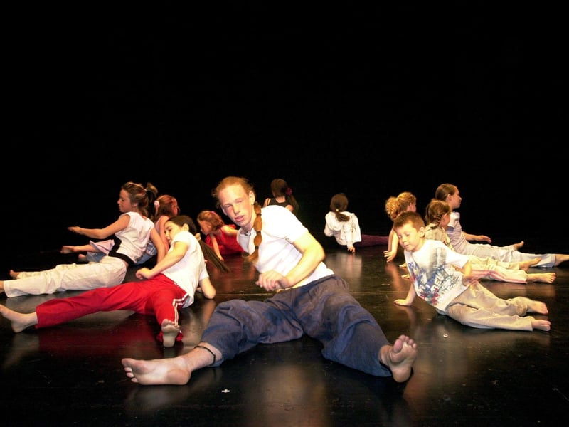 Young people put on a dance performane during the Playhouse Childrens Art Festival. (2907PG08)                               :Derry youngsters enjoying summer in August 2003