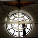 Craig Park, Ritchies Clockmakers, Edinburgh, performing essential maintenance on Derry's Guildhall Clock back in 2007. Photo: Stephen Latimer