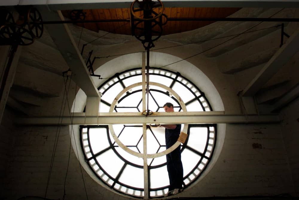Craig Park, Ritchies Clockmakers, Edinburgh, performing essential maintenance on Derry's Guildhall Clock back in 2007. Photo: Stephen Latimer