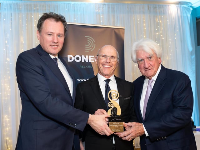 Charlie McConalogue, TD , Minister for Agriculture, Food and Marine and Tom O'Neill making the presentation to David McCourt at the Tip O'Neill Irish Diaspora Awards 2024 in Inishowen Gateway Hotel on Friday last. Photo Clive Wasson