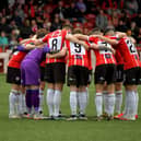 Derry City players in a team huddle before the game. Photo: George Sweeney.  DER2320GS – 118
