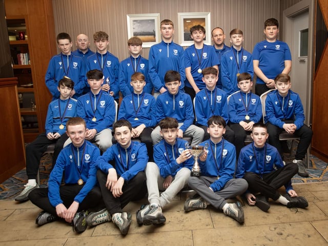 The Oxford 2011 squad pictured with coaches Ruairi Dalzell and Shaun Whoriskey.