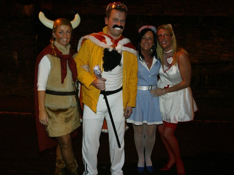 Linda and Dermot McGilloway with Caroline Brown and Annette McGinley.  (0311JB25):20 YEARS ON: Halloween celebrations in Derry in 2003