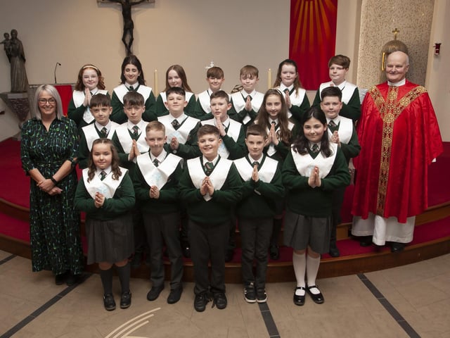 Pupils from Mrs. Fiona Gallick’s class at Greenhaw Primary School who received the Sacrament of Confirmation from Fr. John Farren at St. Brigid’s Church, Carnhill on Monday afternoon last. (Photo: Jim McCafferty Photography)